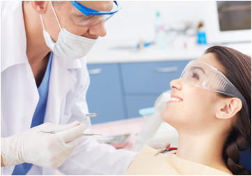 Dentist examining a patient
