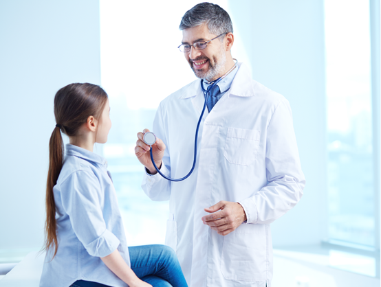 Doctor speaking with a young patient